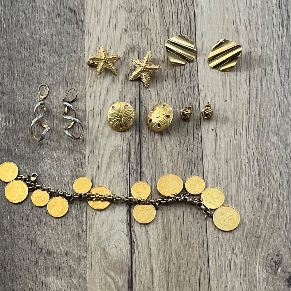 Gold plated coin charm bracelet and earrings.